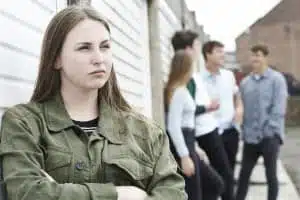 Gang Of Teenagers Hanging Out In Urban Environment